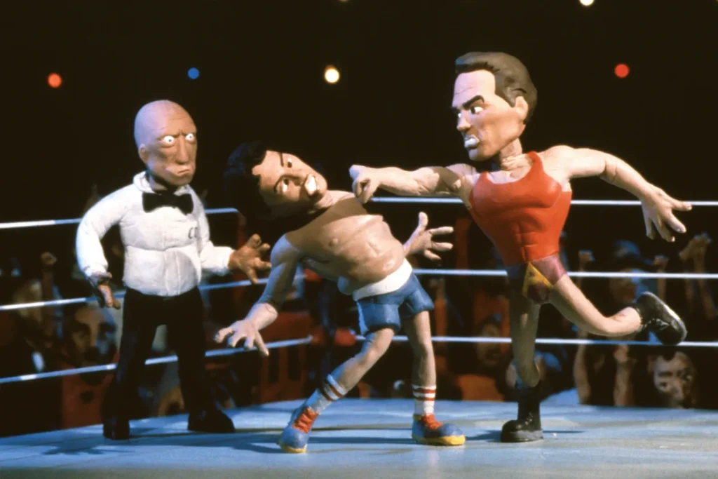 Celebrity Deathmatch TV Series still. Claymation celebrities in a bixing ring for the MTV show Celebrity deathmatch