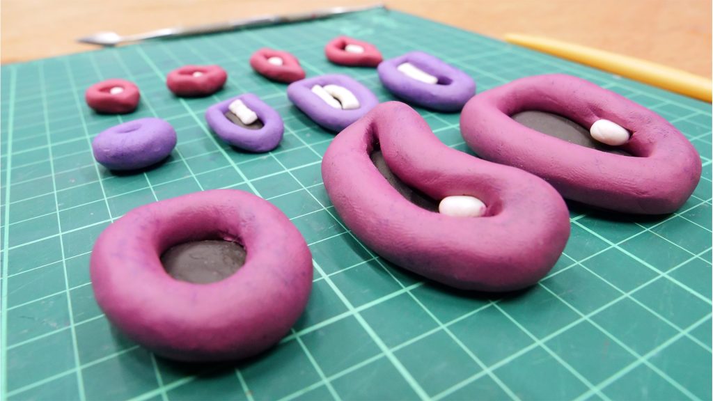 Claymation plasticine mouths lined up for the characters