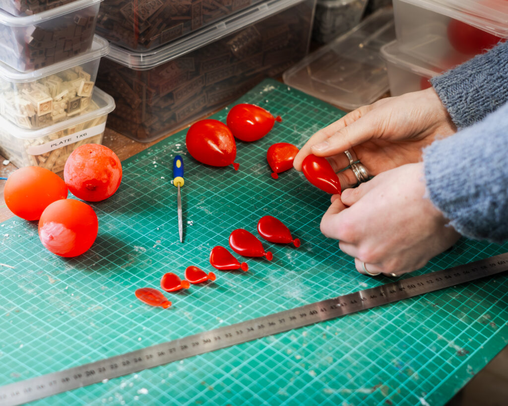 Preparing the claymation balloons for the stop-motion shoot